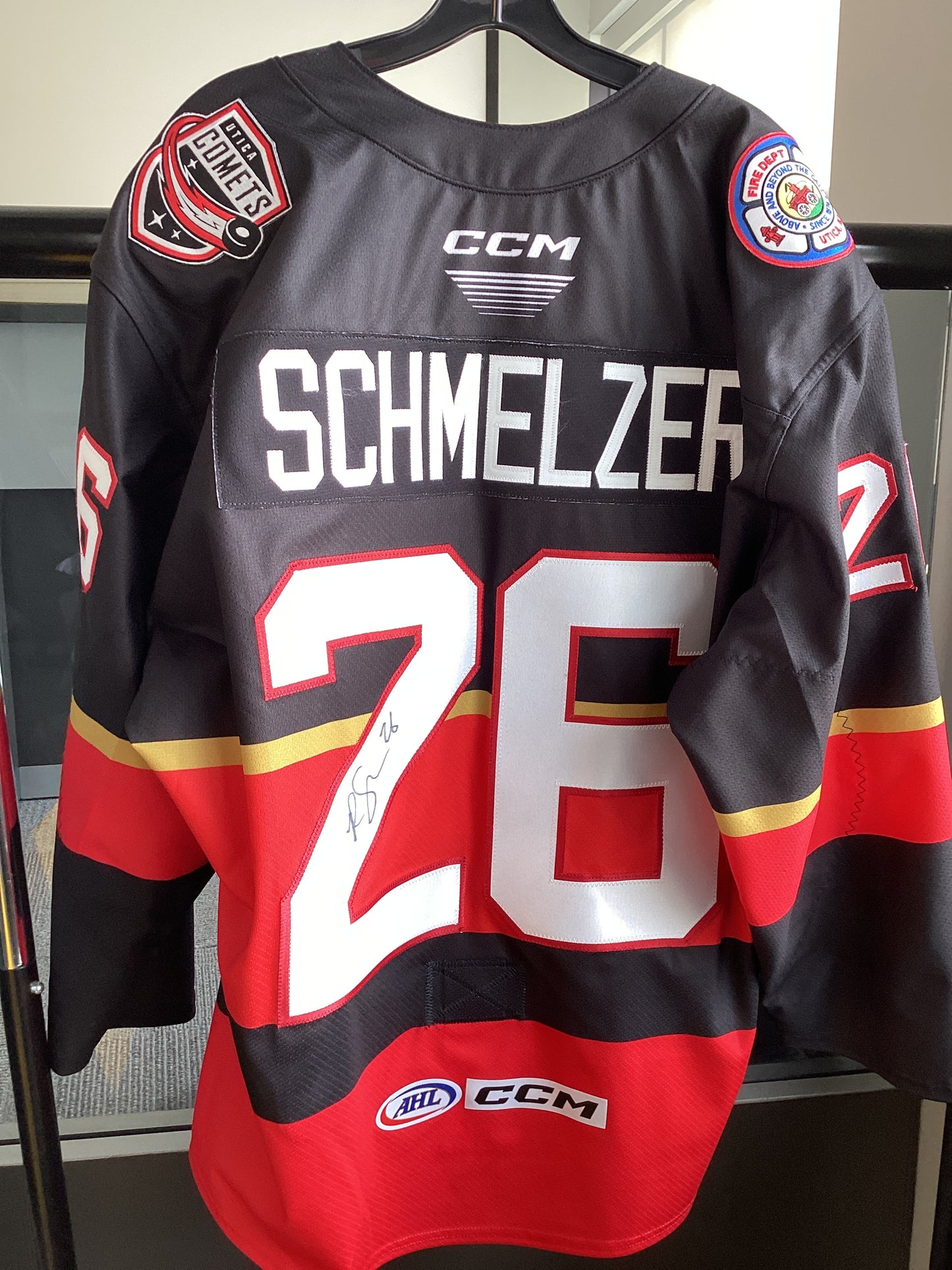 Utica Comets Schmelzer Fire Jersey