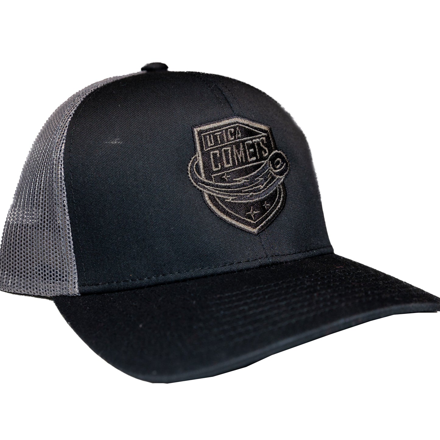 Utica Comets Black/Grey Pacific Headwear Shield Logo Trucker Hat